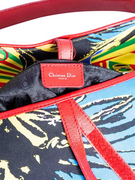 christian dior rasta saddle bag.